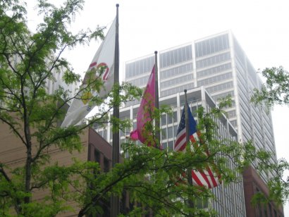 Illinois and USA Flags wave on the Wind 