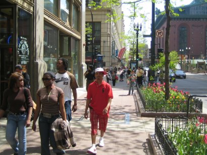 People walk down the streets